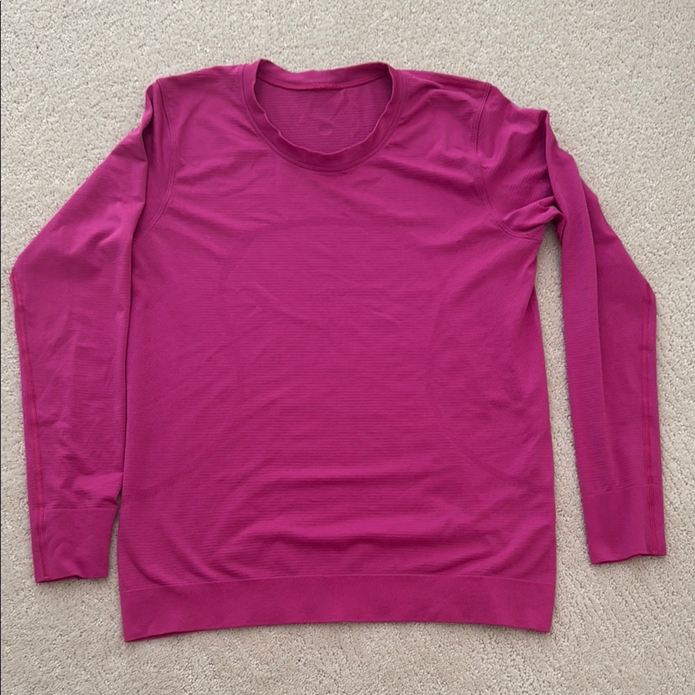 Lululemon swiftly relaxed long sleeve shirt. Color pink. Won maybe 5x.